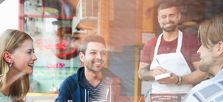 Friends taking order at a Coffee Shop
